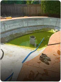 Swimming pool with liner removed in process of repair
